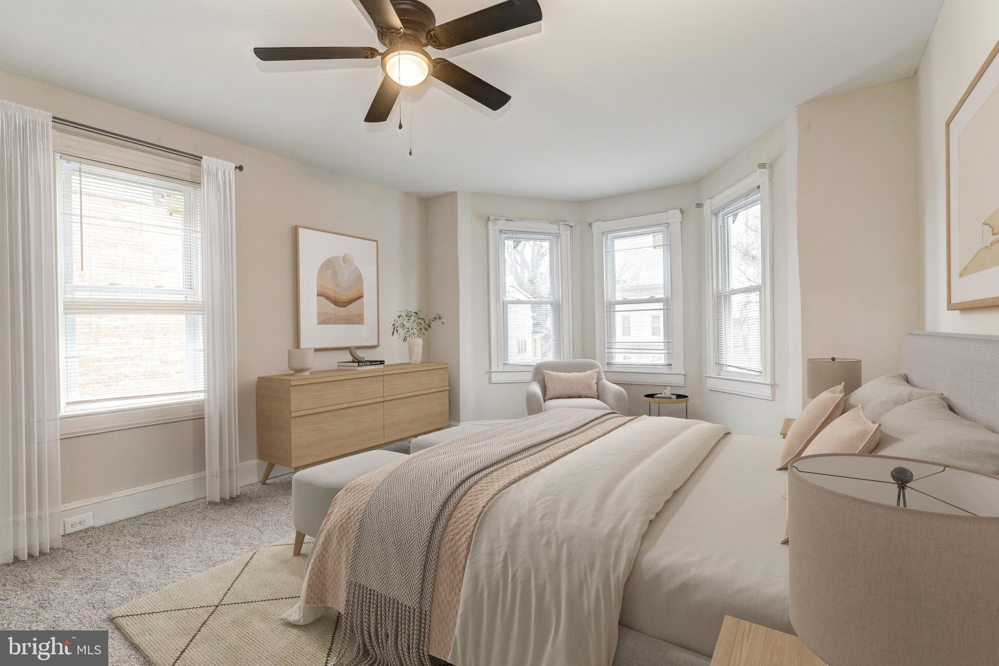 428 South Augusta Avenue Baltimore, MD 21229 - Photo 14 of 28 a bedroom with a bed and a window