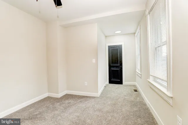 an empty room with a natural light