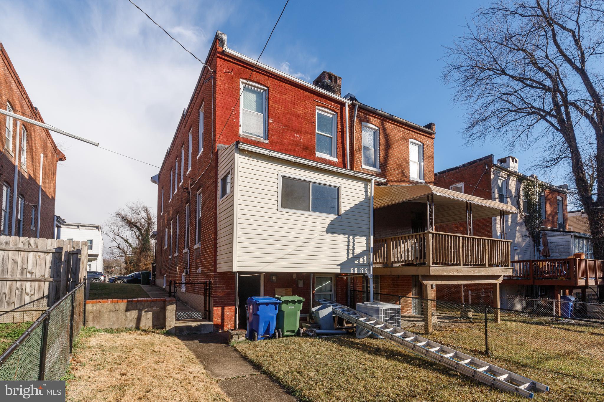 428 South Augusta Avenue Baltimore, MD 21229 - Photo 26 of 28 a front view of a house with a pathway