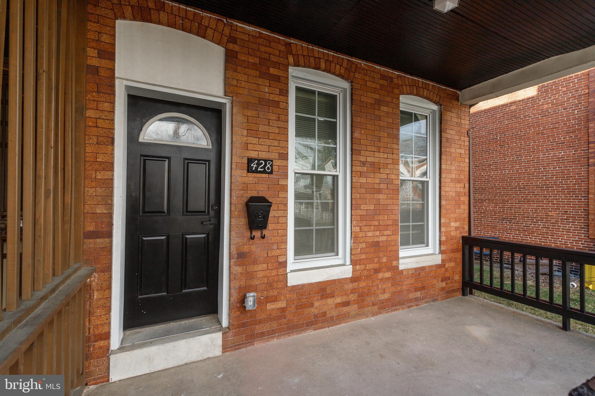 428 South Augusta Avenue Baltimore, MD 21229 - Photo 3 of 28 a view of front door and porch