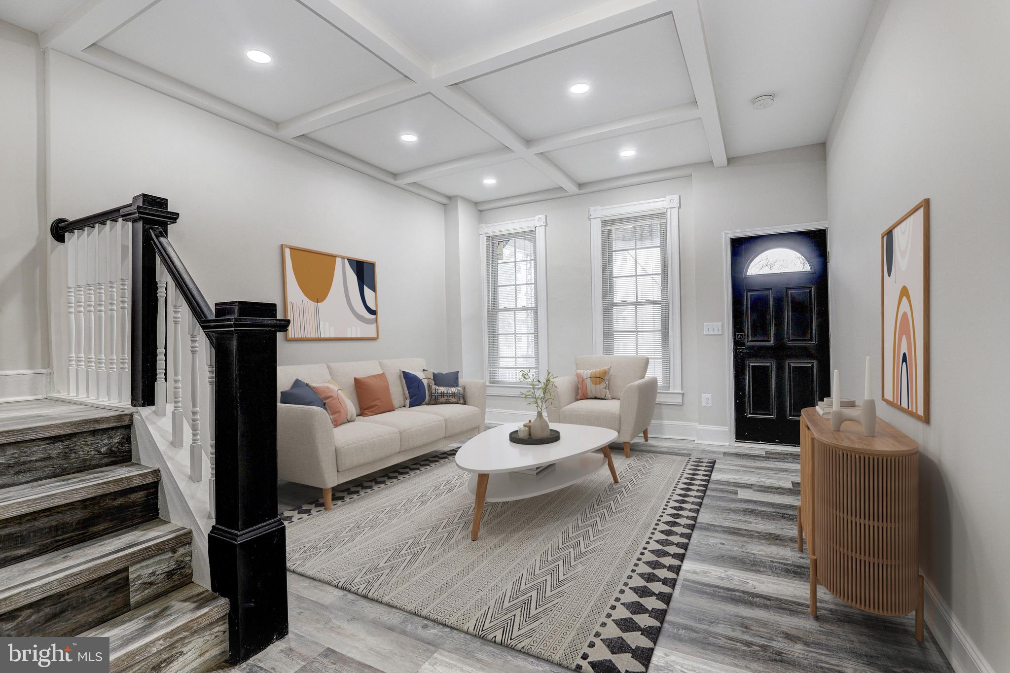 428 South Augusta Avenue Baltimore, MD 21229 - Photo 4 of 28 a living room with furniture and wooden floor