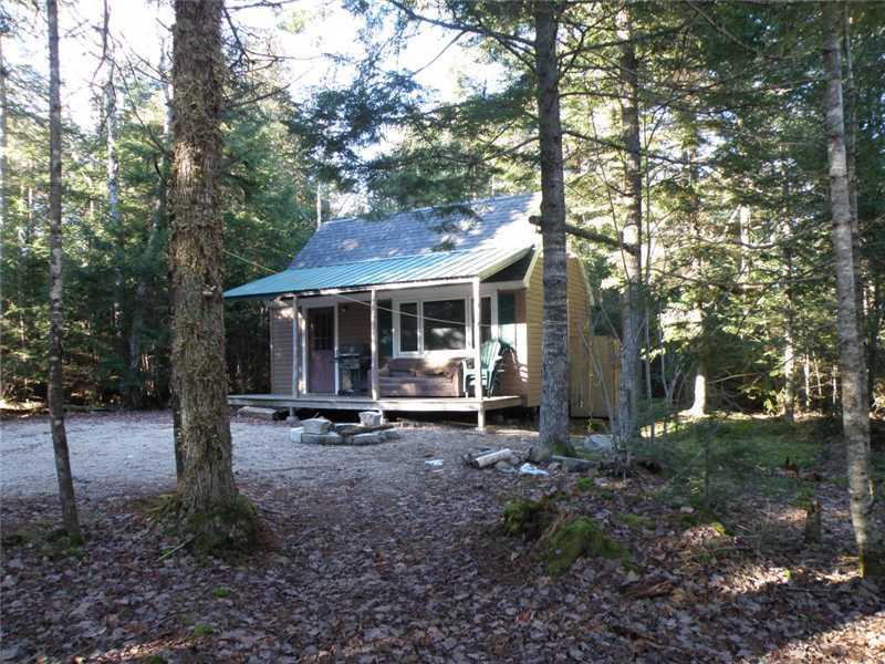 Lot 20 Raymond Road Beddington, ME 04622 - Photo 1 of 11 Exterior Front. Camp sits discreetly...