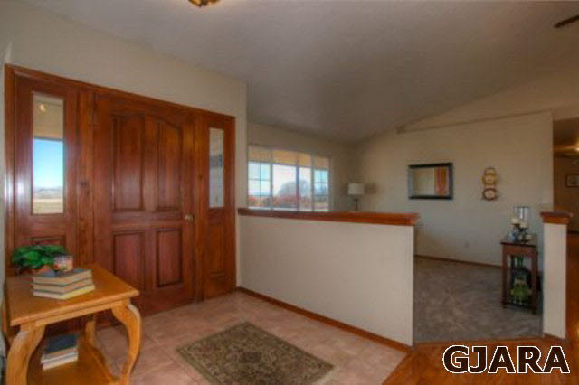 1321 17 Road Fruita, CO 81521 - Photo 3 of 26 a room with furniture and window