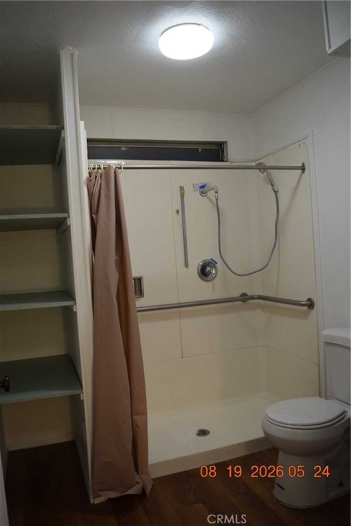 23500 The Old Road, Unit 9 Newhall, CA 91321 - Photo 45 of 56 main restroom - ADA accessible walk-in shower.