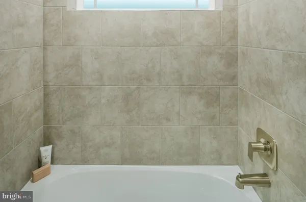 a bathroom with a bathtub