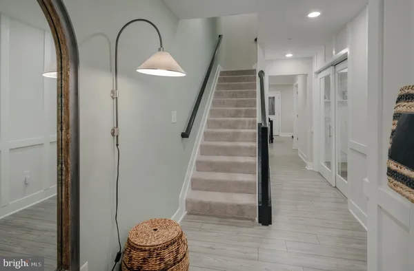 a view of entryway with wooden floor