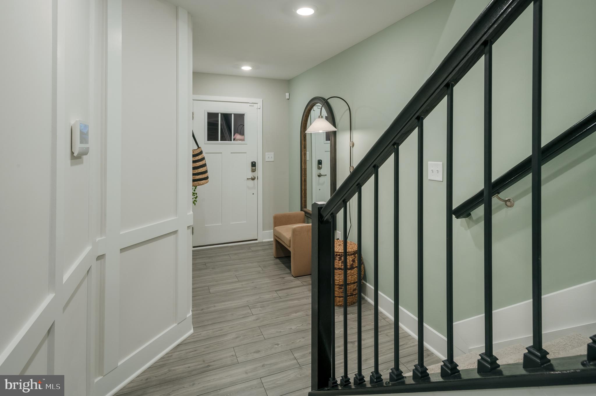 1801 Betterton Road Essex, MD 21221 - Photo 24 of 34 a view of an entryway with wooden floor and stairs