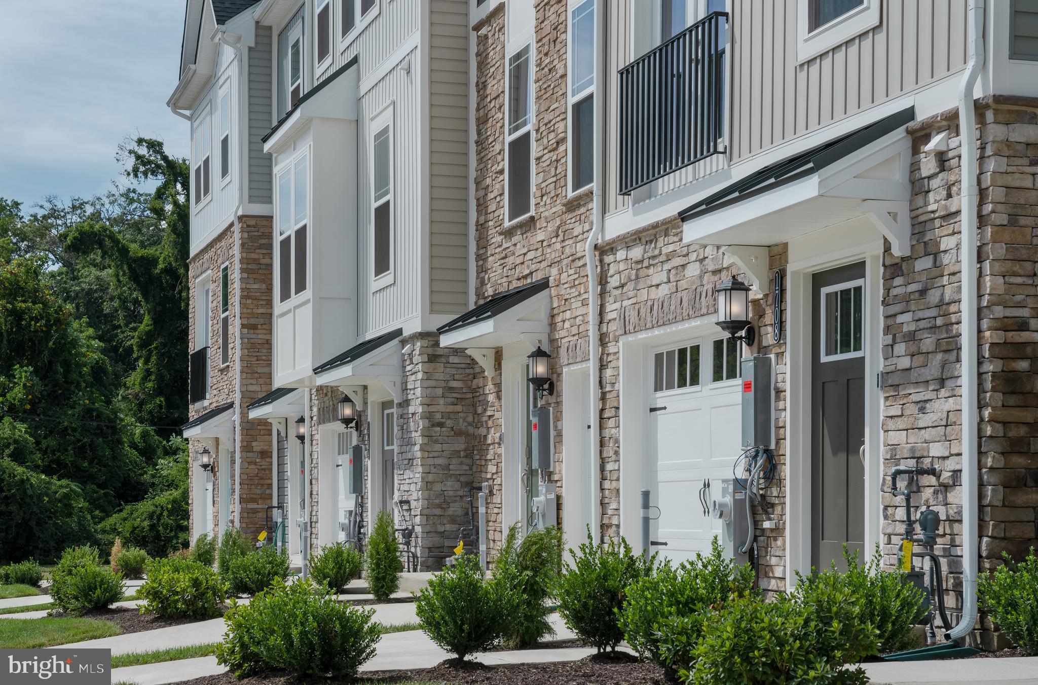 1801 Betterton Road Essex, MD 21221 - Photo 33 of 34 a view of a building with a garden