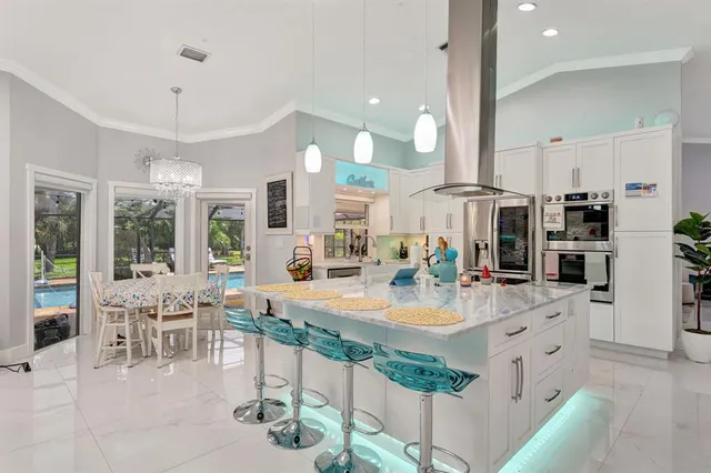 a living room with fireplace furniture and a flat screen tv
