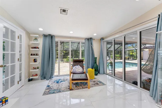 a bathroom with a shower and a sink