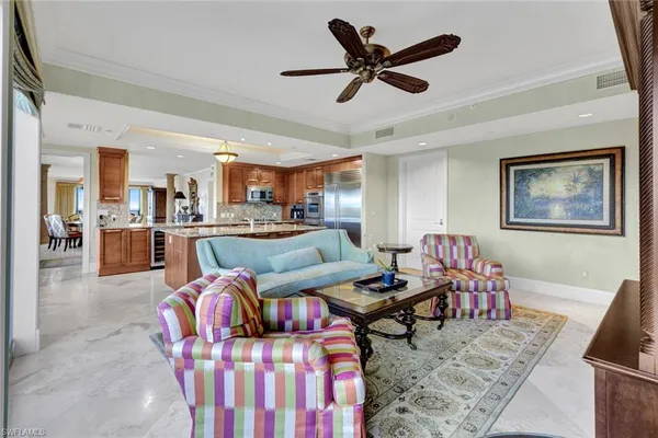 a kitchen with stainless steel appliances granite countertop a stove and a refrigerator