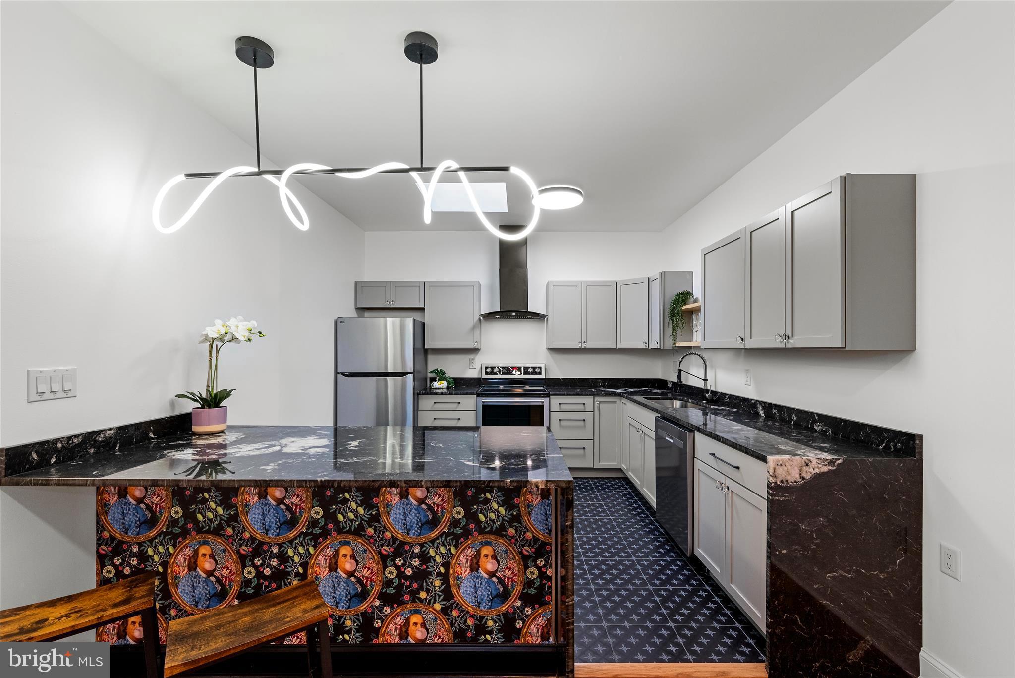 Massive, Polished Stone Counter Bar with Waterfall