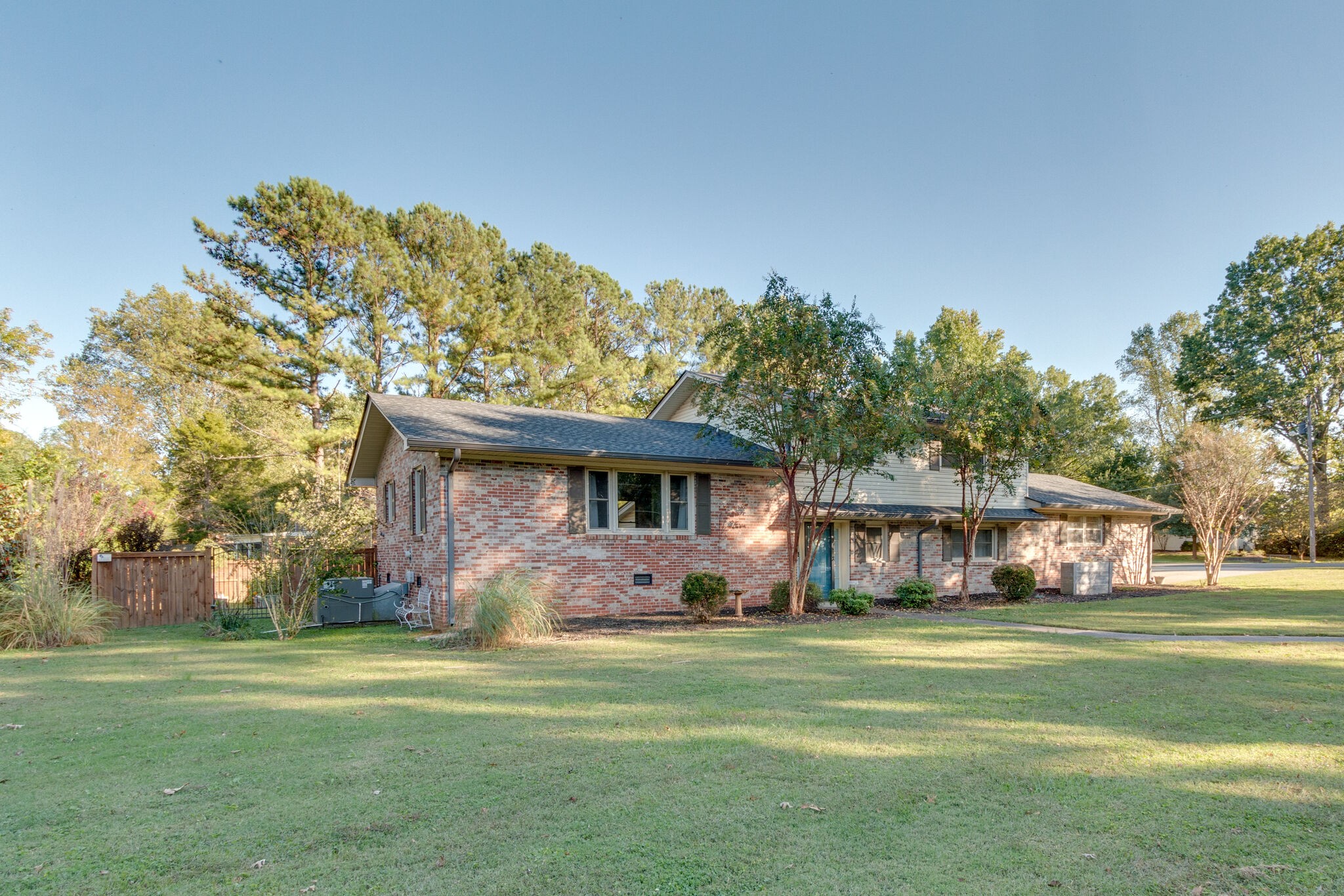1202 Raleigh Court Murfreesboro, TN 37130 - Photo 2 of 34 a front view of house with yard and trees in the background