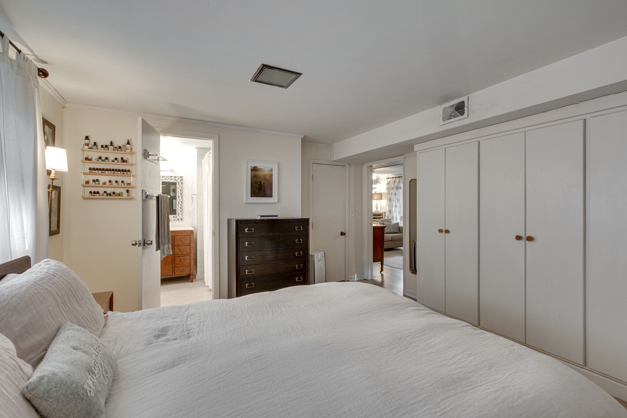 1202 Raleigh Court Murfreesboro, TN 37130 - Photo 21 of 34 a bedroom with a bed and a chandelier