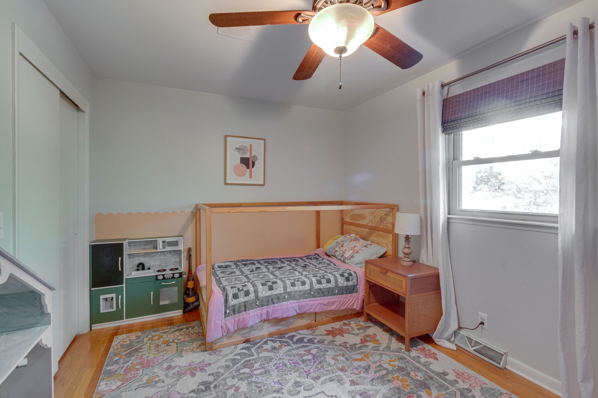 1202 Raleigh Court Murfreesboro, TN 37130 - Photo 23 of 34 a bedroom with a bed and a chandelier