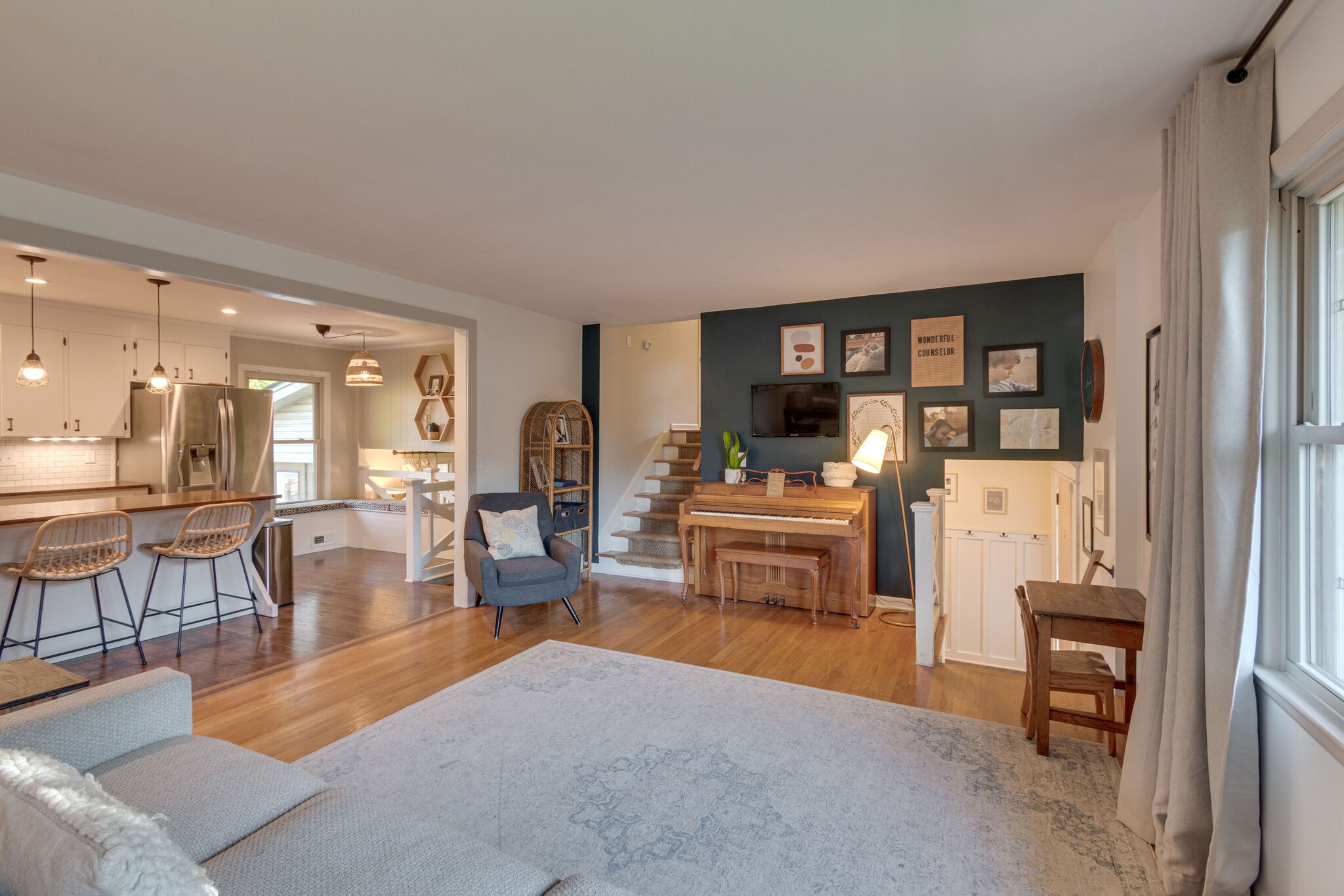 1202 Raleigh Court Murfreesboro, TN 37130 - Photo 9 of 34 a living room with furniture and a dining table with kitchen appliances