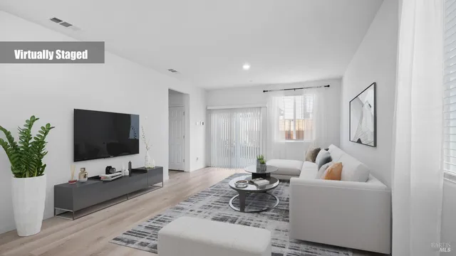 a view of a balcony with chair and table