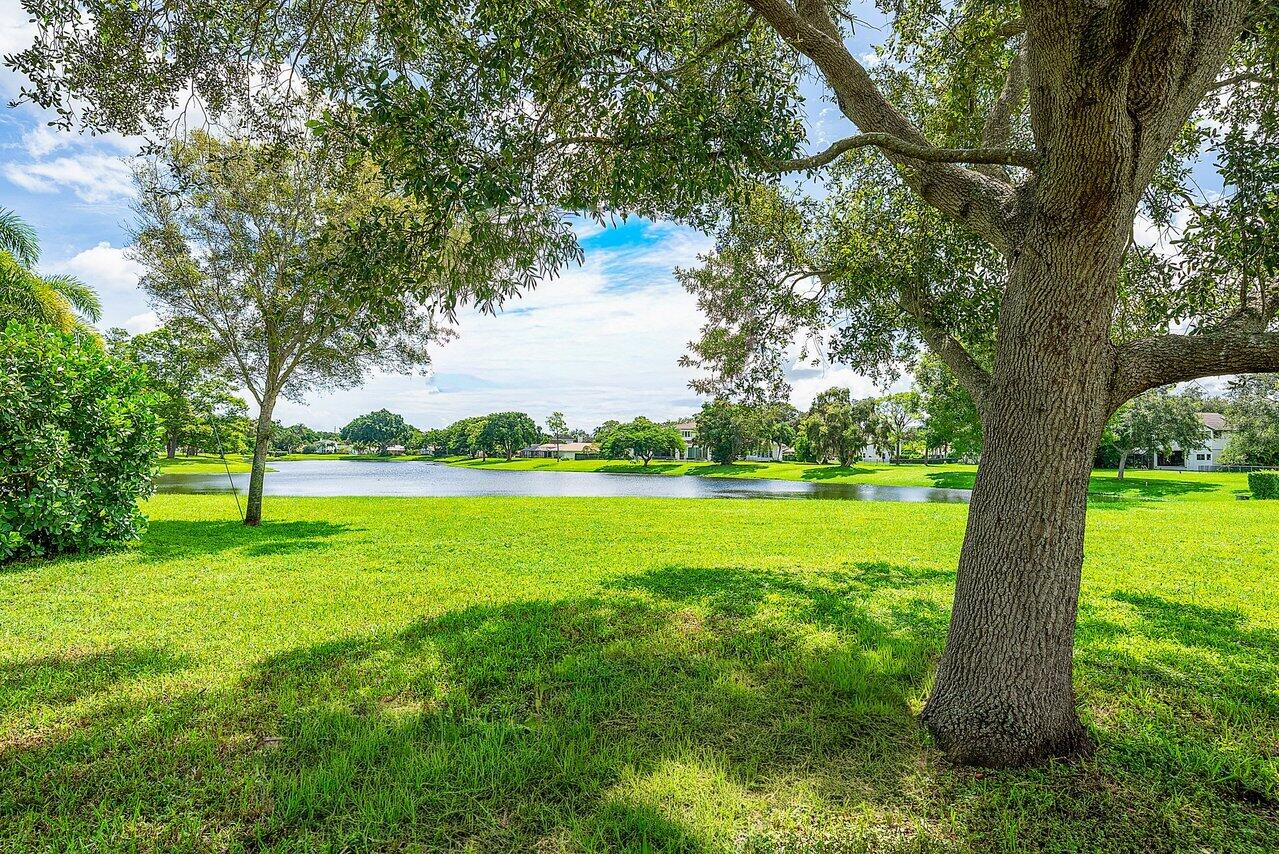 2238 Northwest 30th Road Boca Raton, FL 33431 - Photo 14 of 27 a view of a lake with a yard