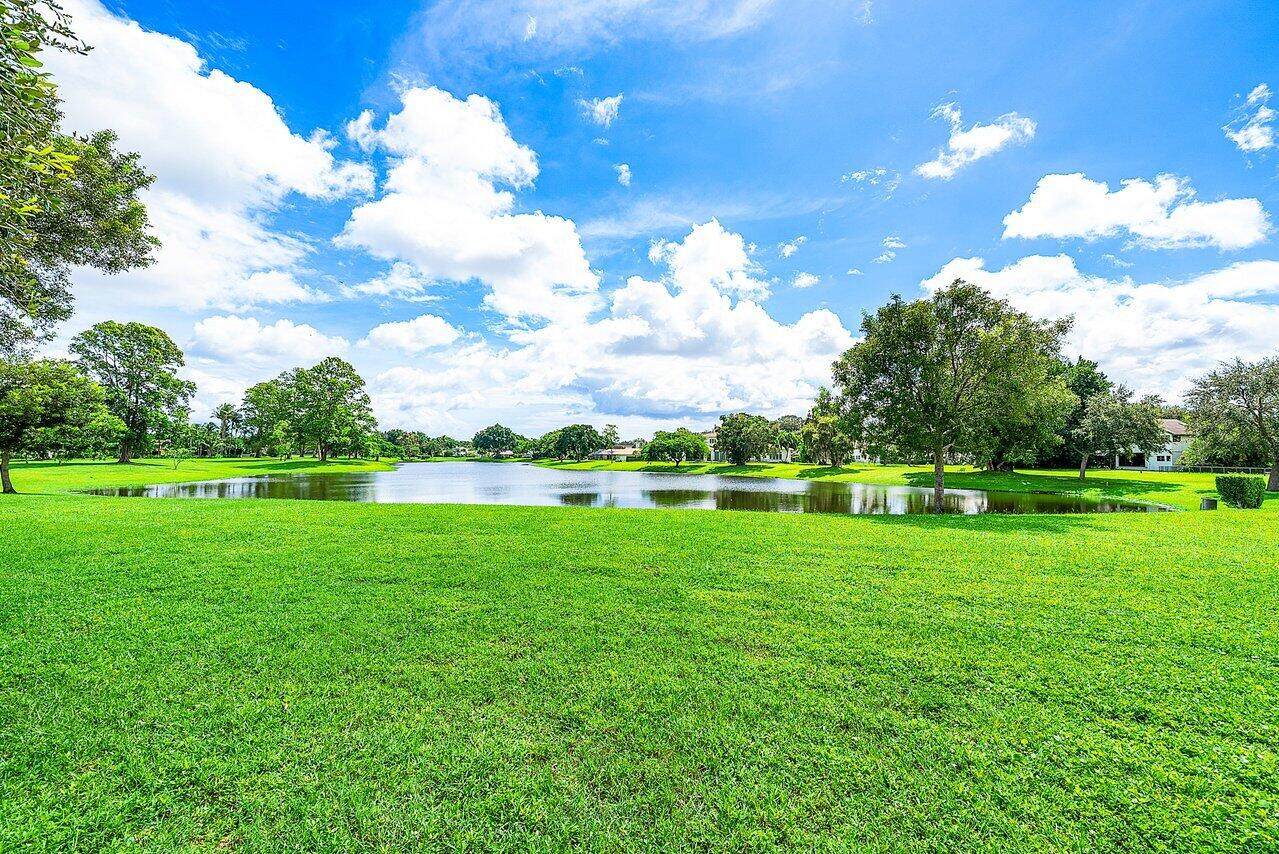 2238 Northwest 30th Road Boca Raton, FL 33431 - Photo 15 of 27 a view of a golf course with a lake