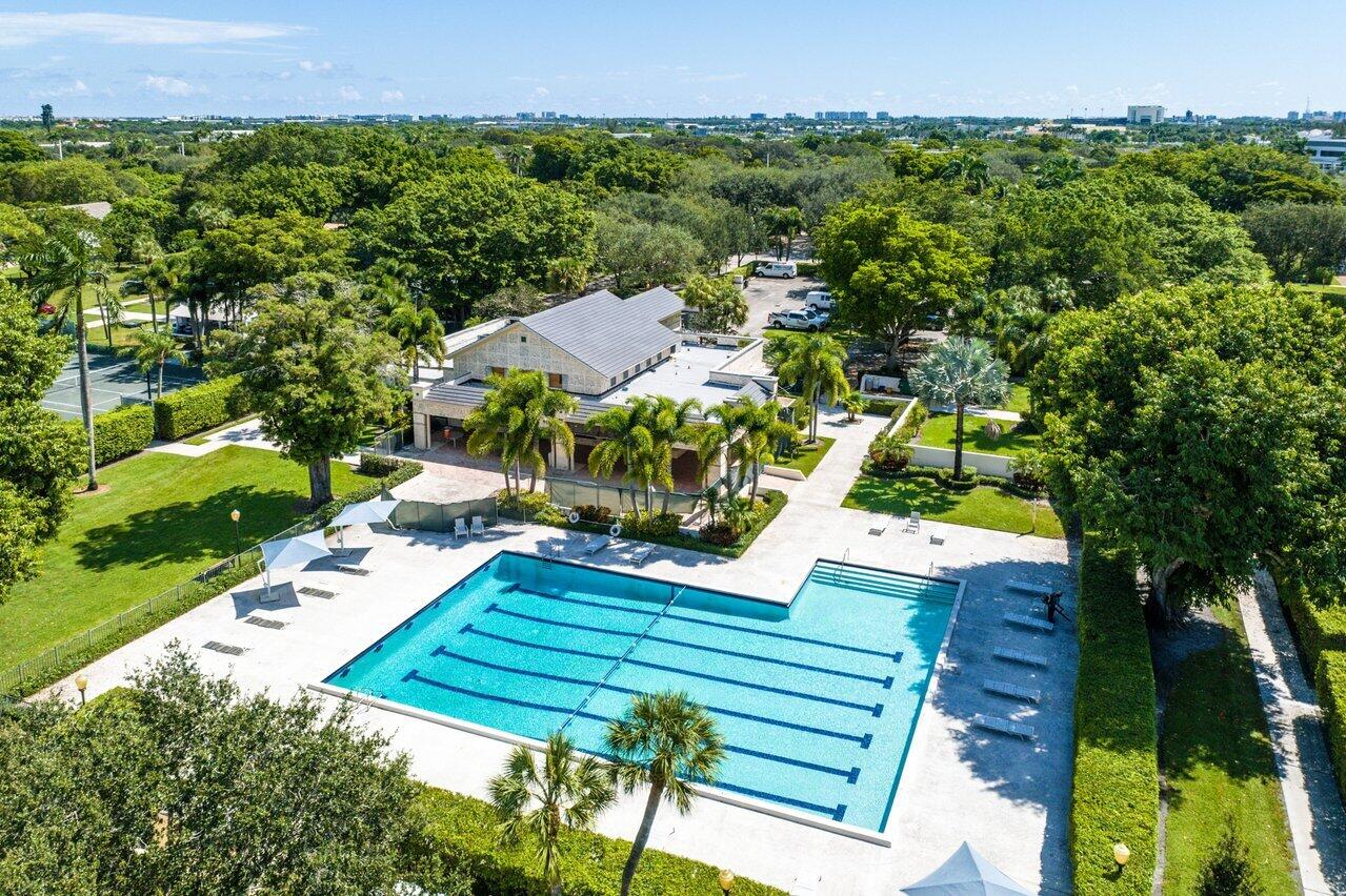 2238 Northwest 30th Road Boca Raton, FL 33431 - Photo 18 of 27 an aerial view of a house with a yard and lake view