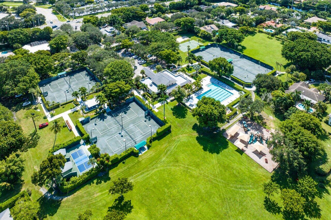 2238 Northwest 30th Road Boca Raton, FL 33431 - Photo 22 of 27 an aerial view of residential houses with outdoor space and trees all around