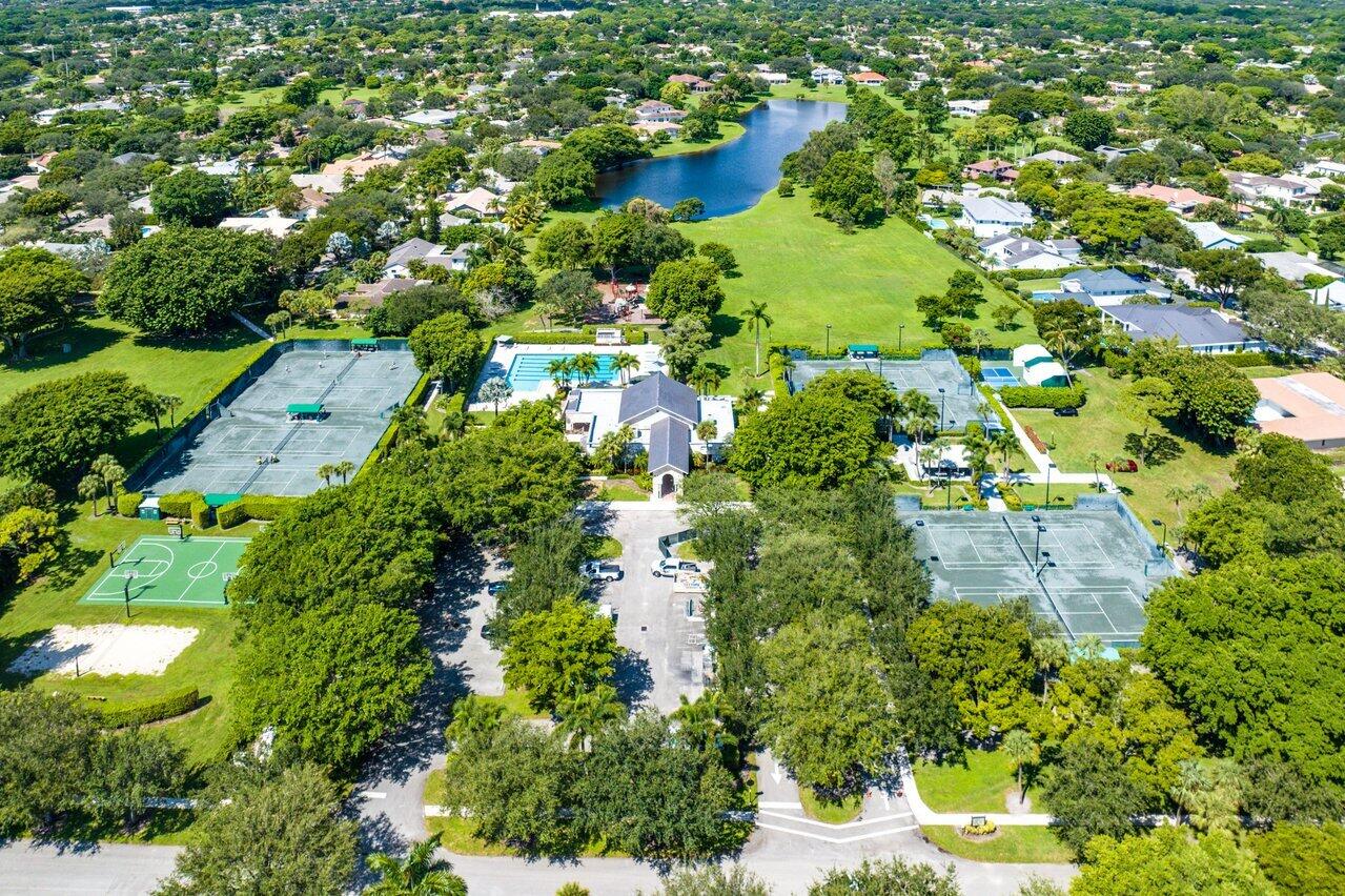 2238 Northwest 30th Road Boca Raton, FL 33431 - Photo 23 of 27 an aerial view of residential houses with outdoor space and trees all around