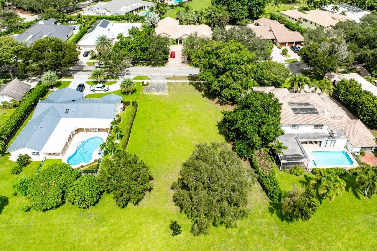 2238 Northwest 30th Road Boca Raton, FL 33431 - Photo 9 of 27 an aerial view of residential houses with yard