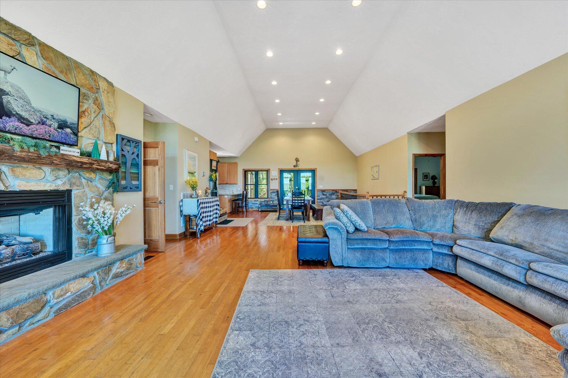 4939 Wade Road Roanoke, VA 24018 - Photo 24 of 57 a living room with furniture and a fireplace