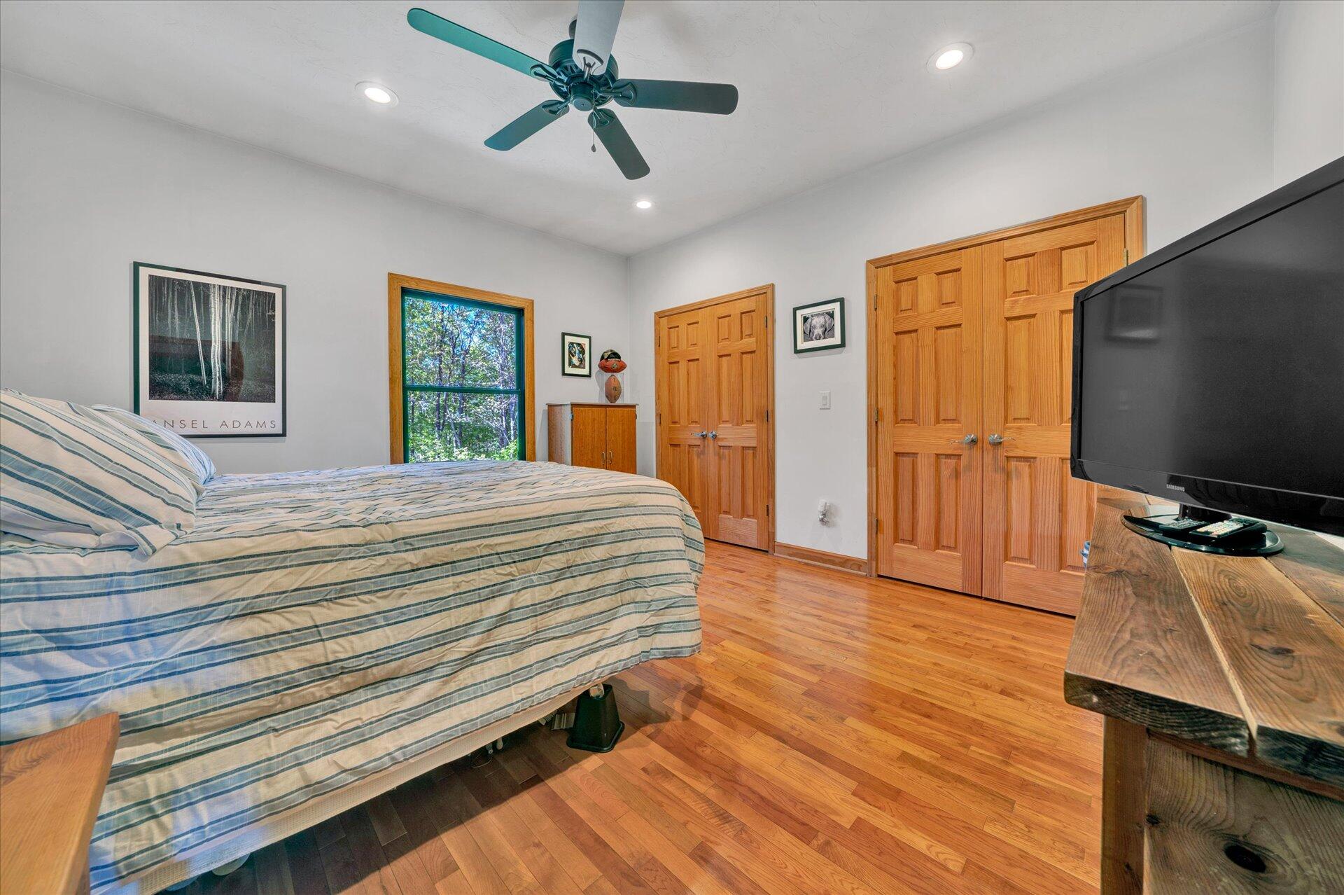 4939 Wade Road Roanoke, VA 24018 - Photo 38 of 57 a bedroom with a bed and a flat screen tv