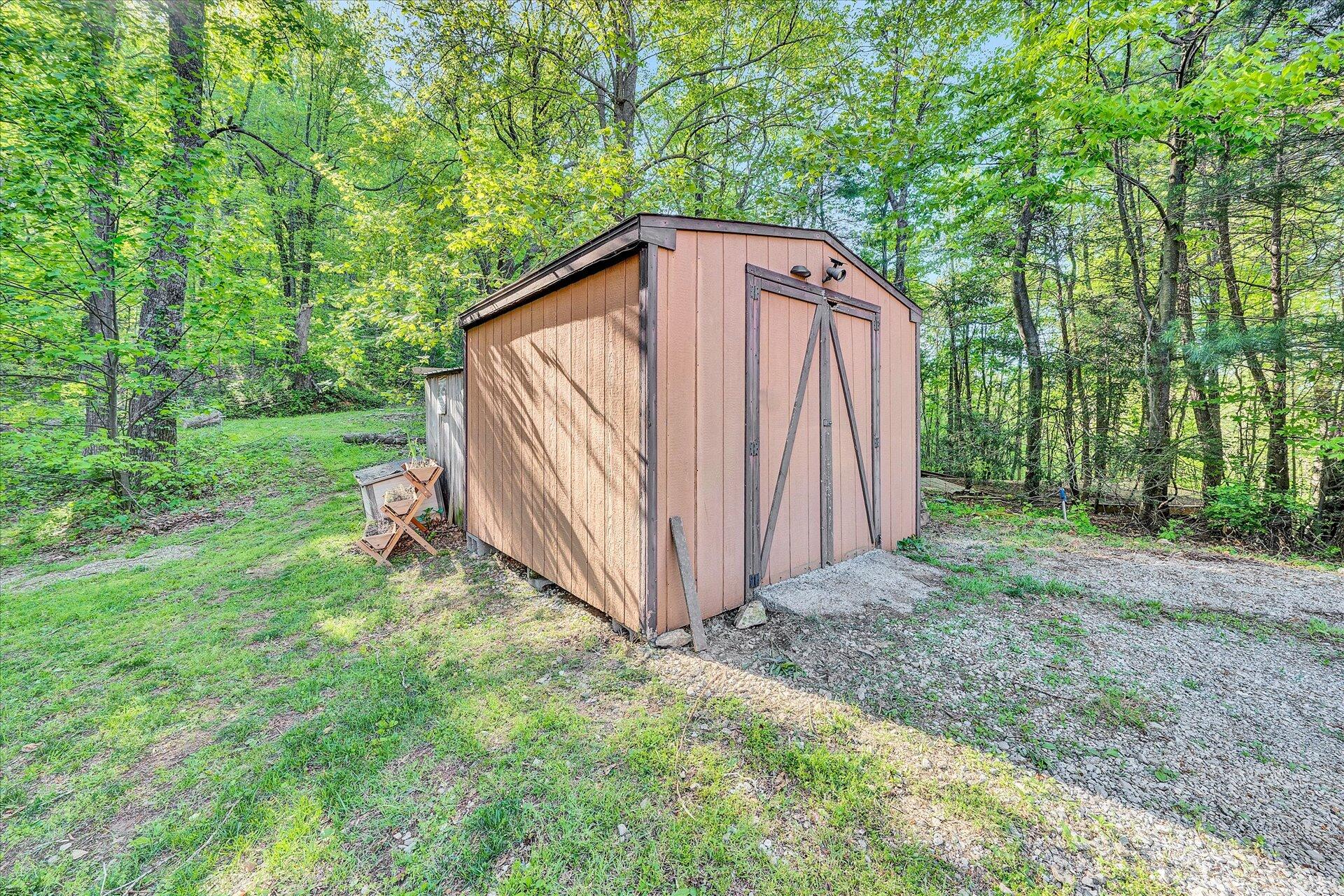 4939 Wade Road Roanoke, VA 24018 - Photo 48 of 57 a view of a backyard with barn