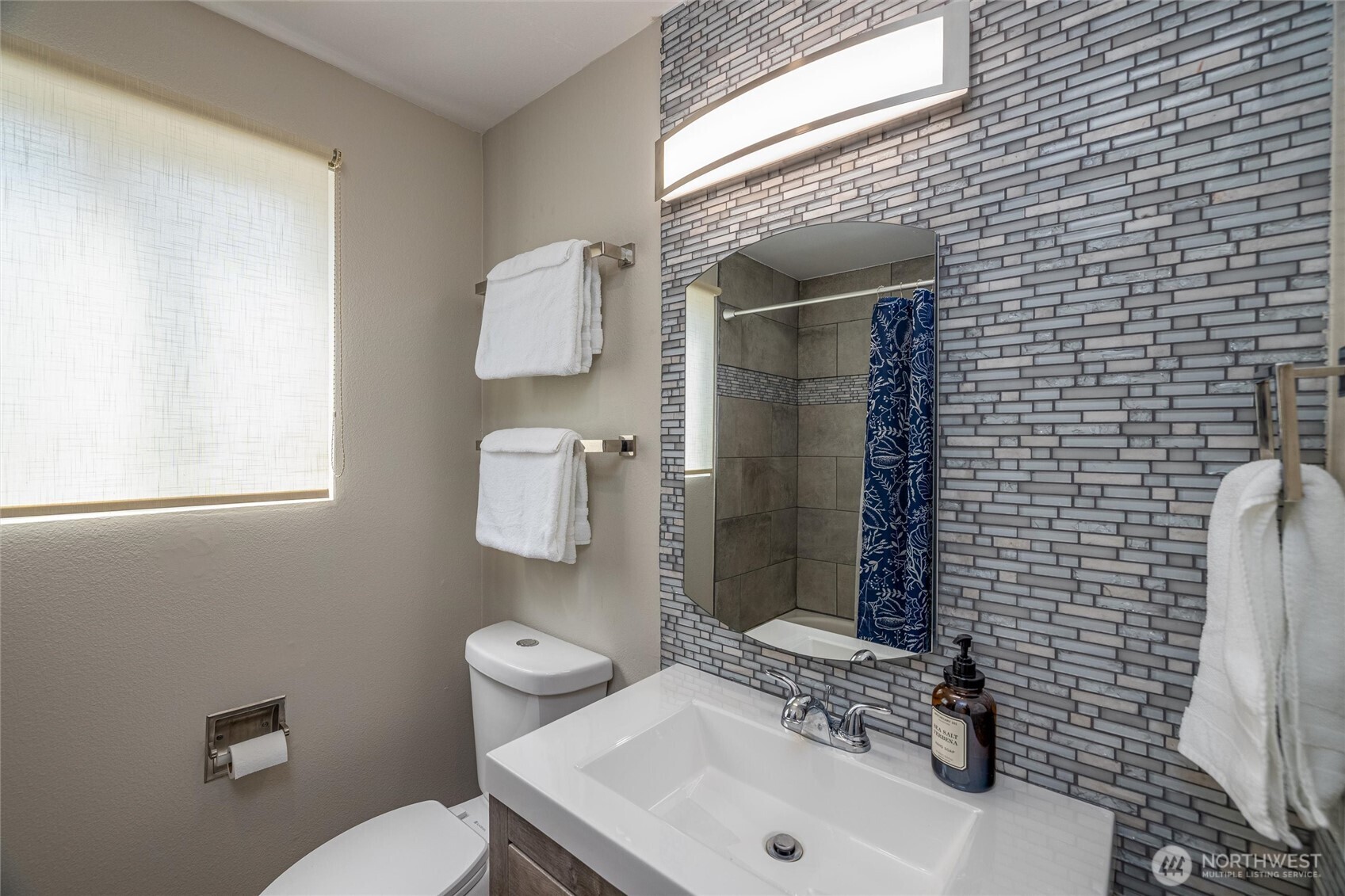 3456 Emma Road Bellingham, WA 98226 - Photo 15 of 32 a bathroom with a sink and toilet