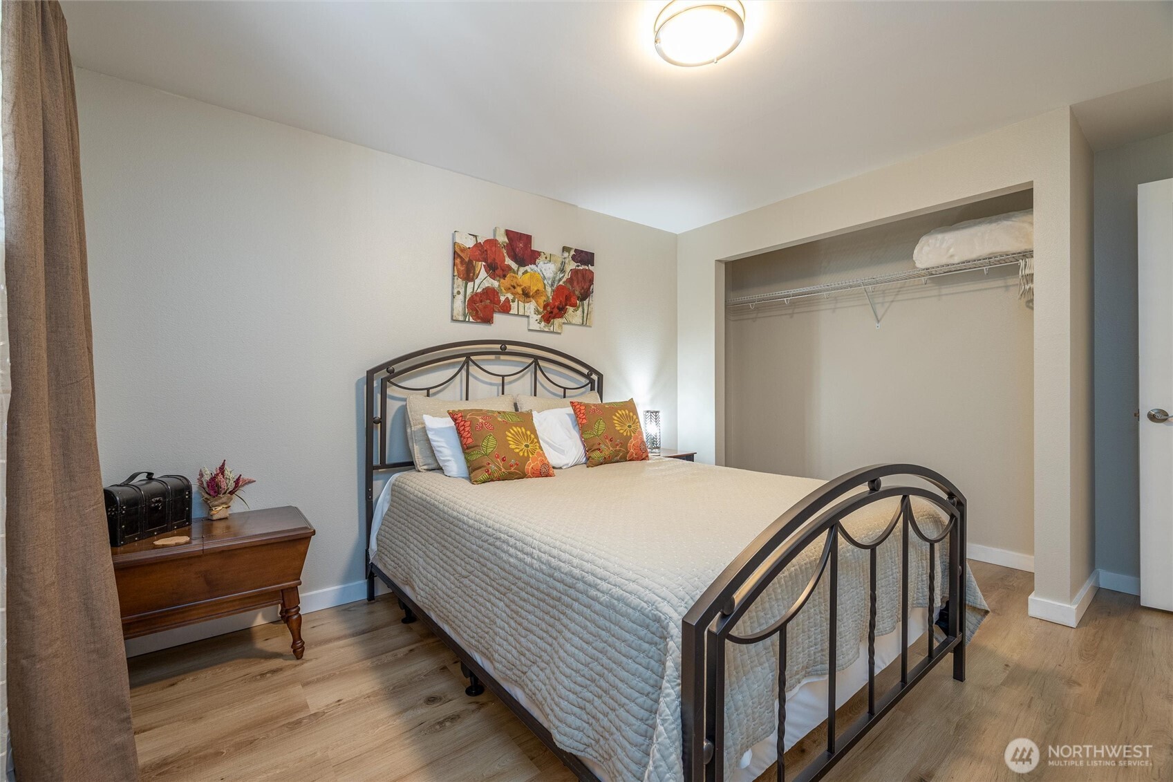 3456 Emma Road Bellingham, WA 98226 - Photo 19 of 32 a bedroom with a bed and a dresser