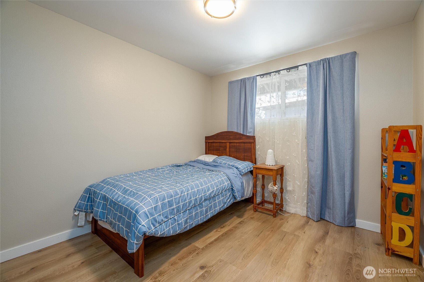 3456 Emma Road Bellingham, WA 98226 - Photo 20 of 32 a bedroom with a bed and dresser
