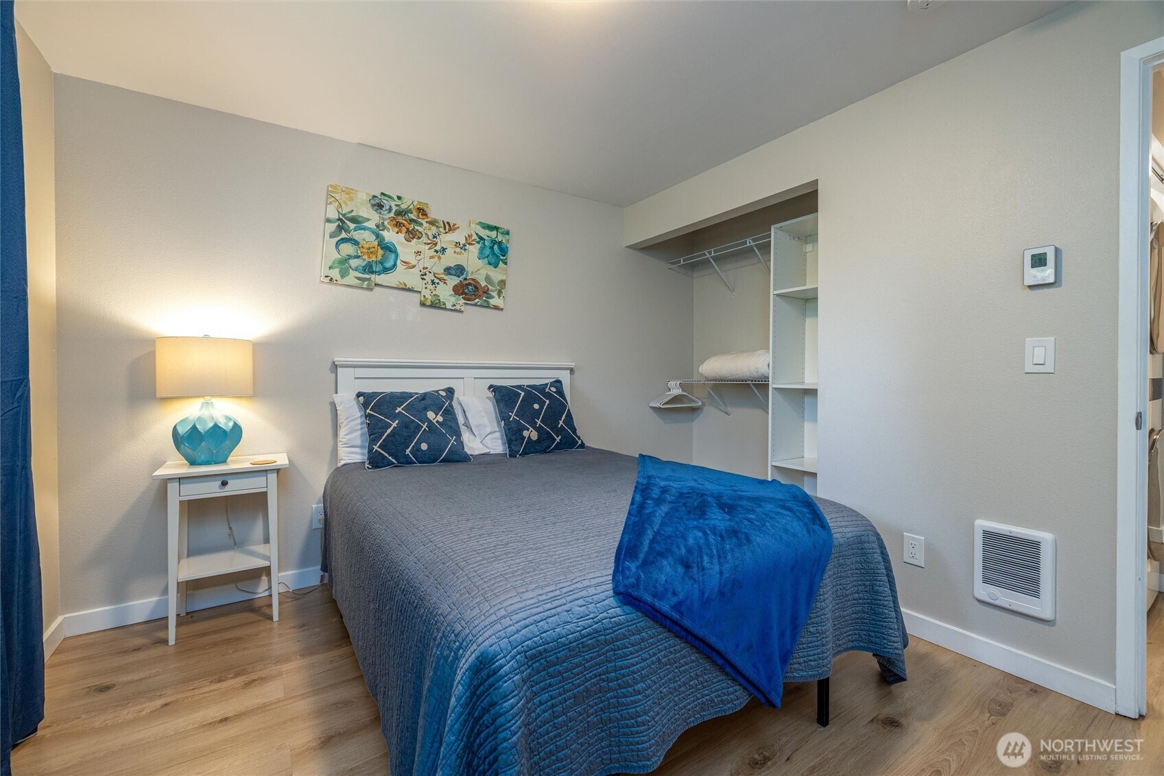 3456 Emma Road Bellingham, WA 98226 - Photo 24 of 32 a bedroom with a bed and a lamp