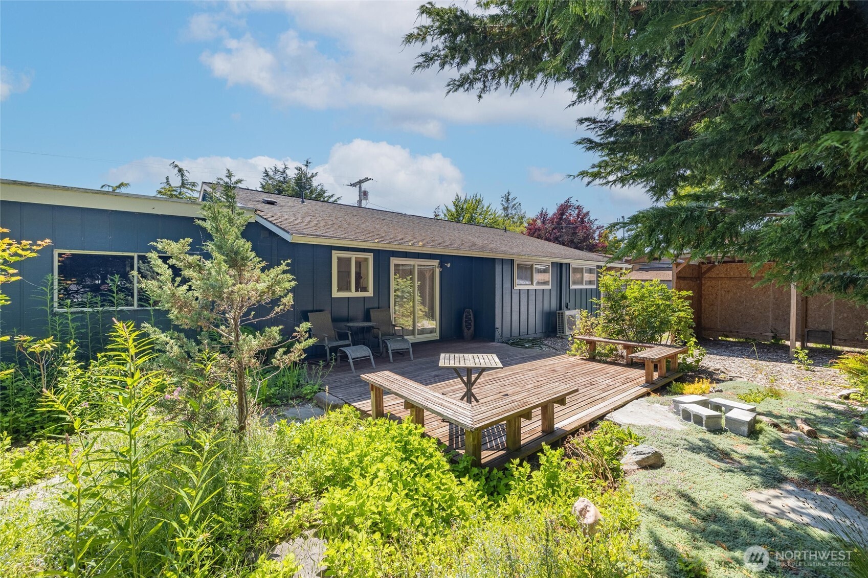 3456 Emma Road Bellingham, WA 98226 - Photo 28 of 32 a view of the house with backyard and sitting area