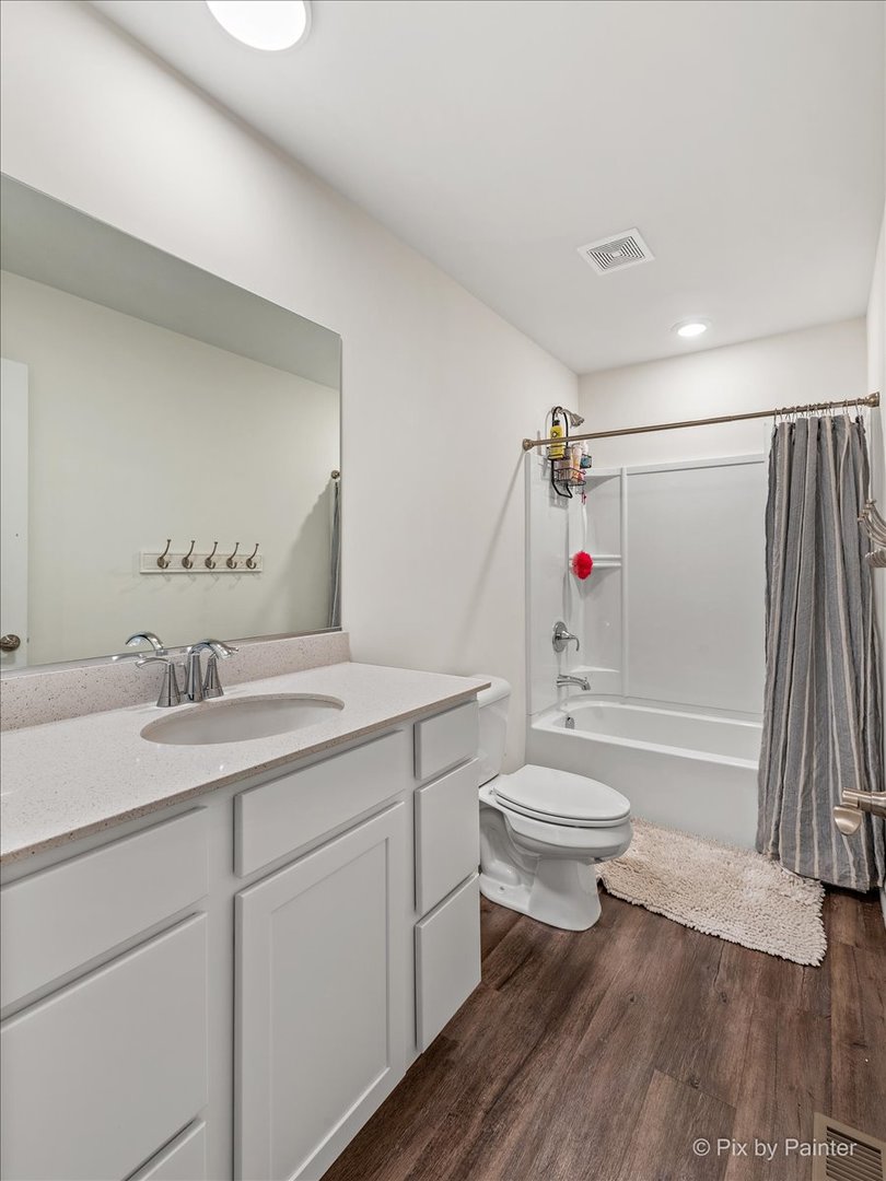 1315 Sage Circle Joliet, IL 60431 - Photo 24 of 27 a bathroom with a sink a toilet and shower