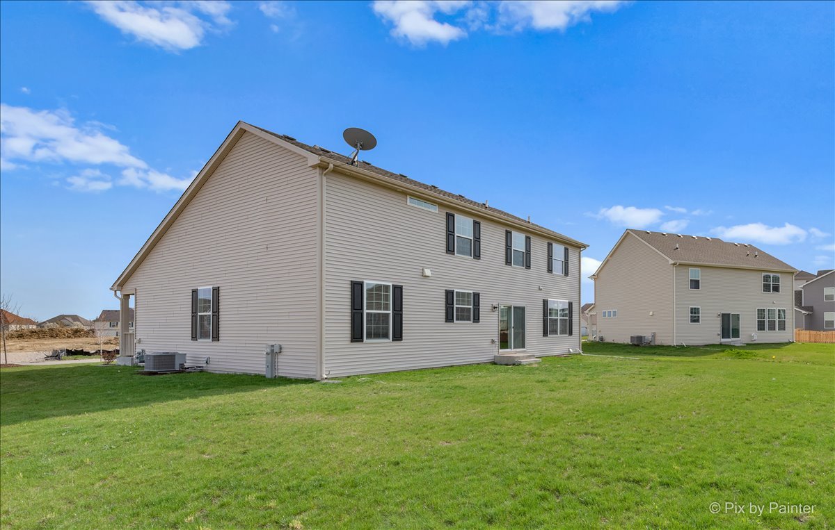 1315 Sage Circle Joliet, IL 60431 - Photo 25 of 27 a view of a house with backyard