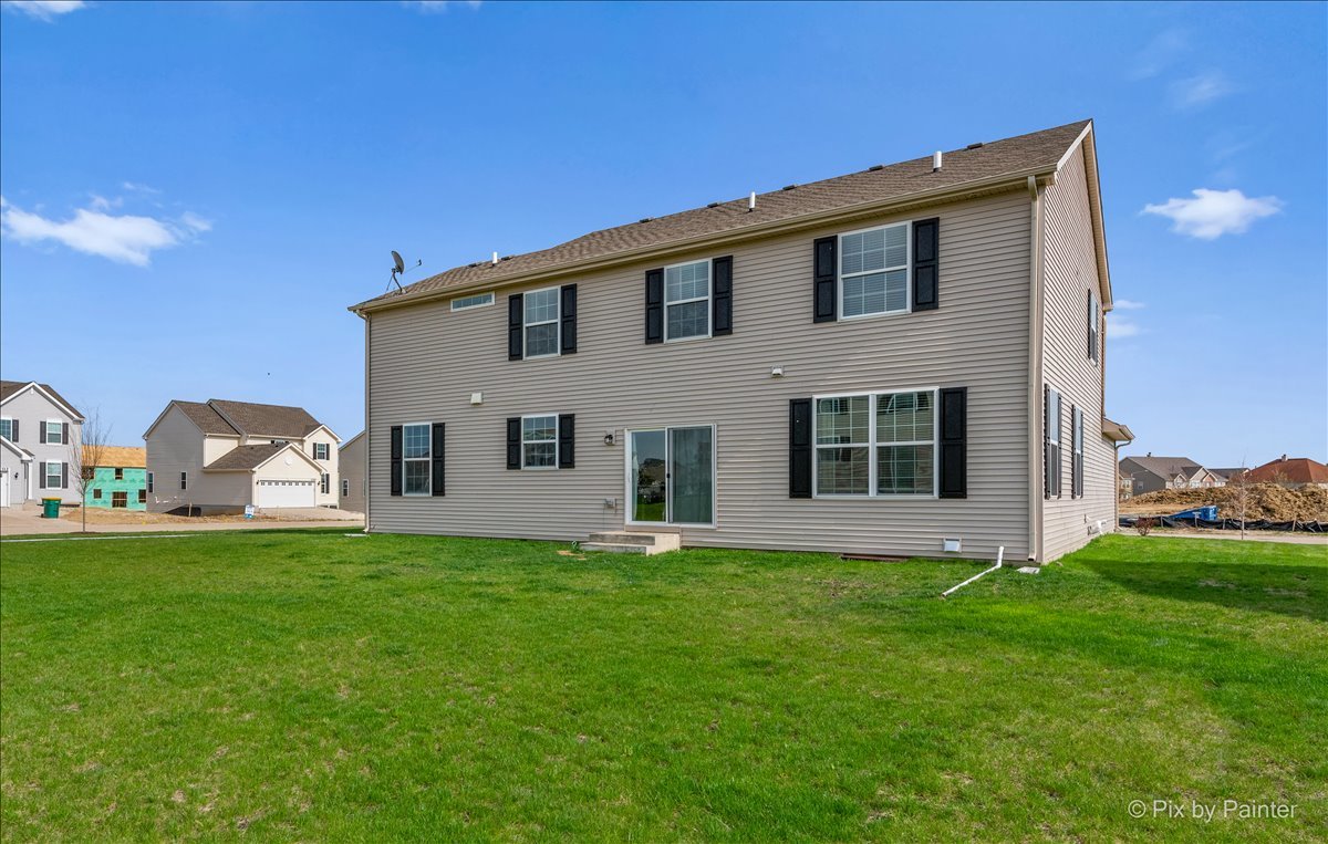 1315 Sage Circle Joliet, IL 60431 - Photo 26 of 27 a house view with a garden space