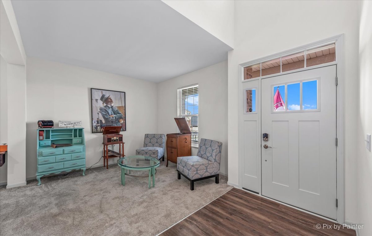 1315 Sage Circle Joliet, IL 60431 - Photo 3 of 27 a living room with furniture and a table