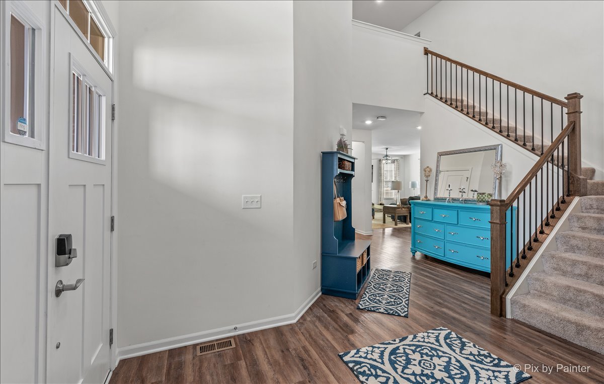 1315 Sage Circle Joliet, IL 60431 - Photo 4 of 27 a view of entryway with wooden floor