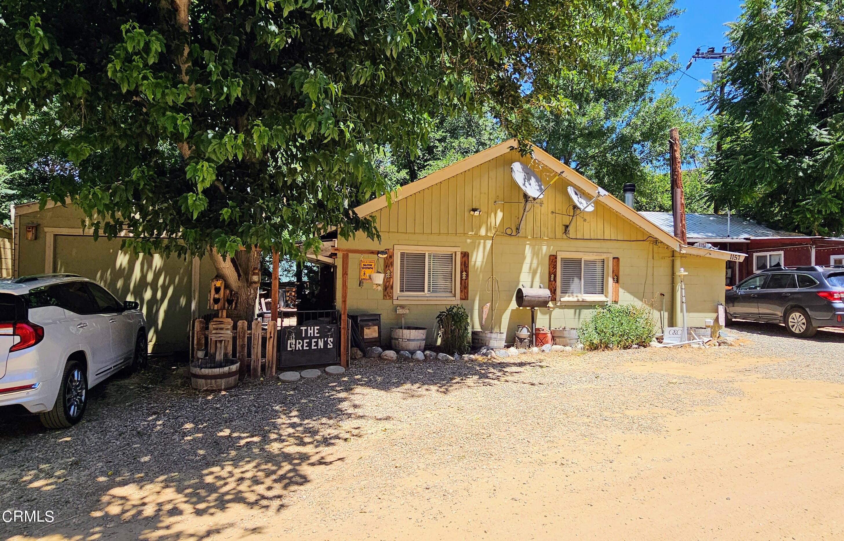 1157 Eugene Maricopa Ca Maricopa, CA 93252 - Photo 1 of 28 a front view of a house with a yard