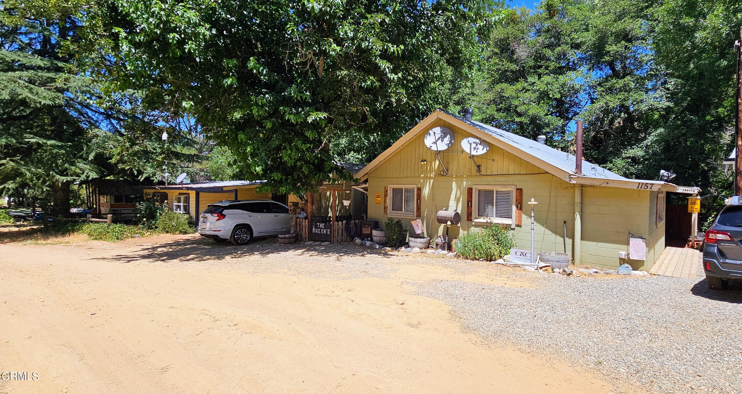 1157 Eugene Maricopa Ca Maricopa, CA 93252 - Photo 15 of 28 a front view of a house with a yard