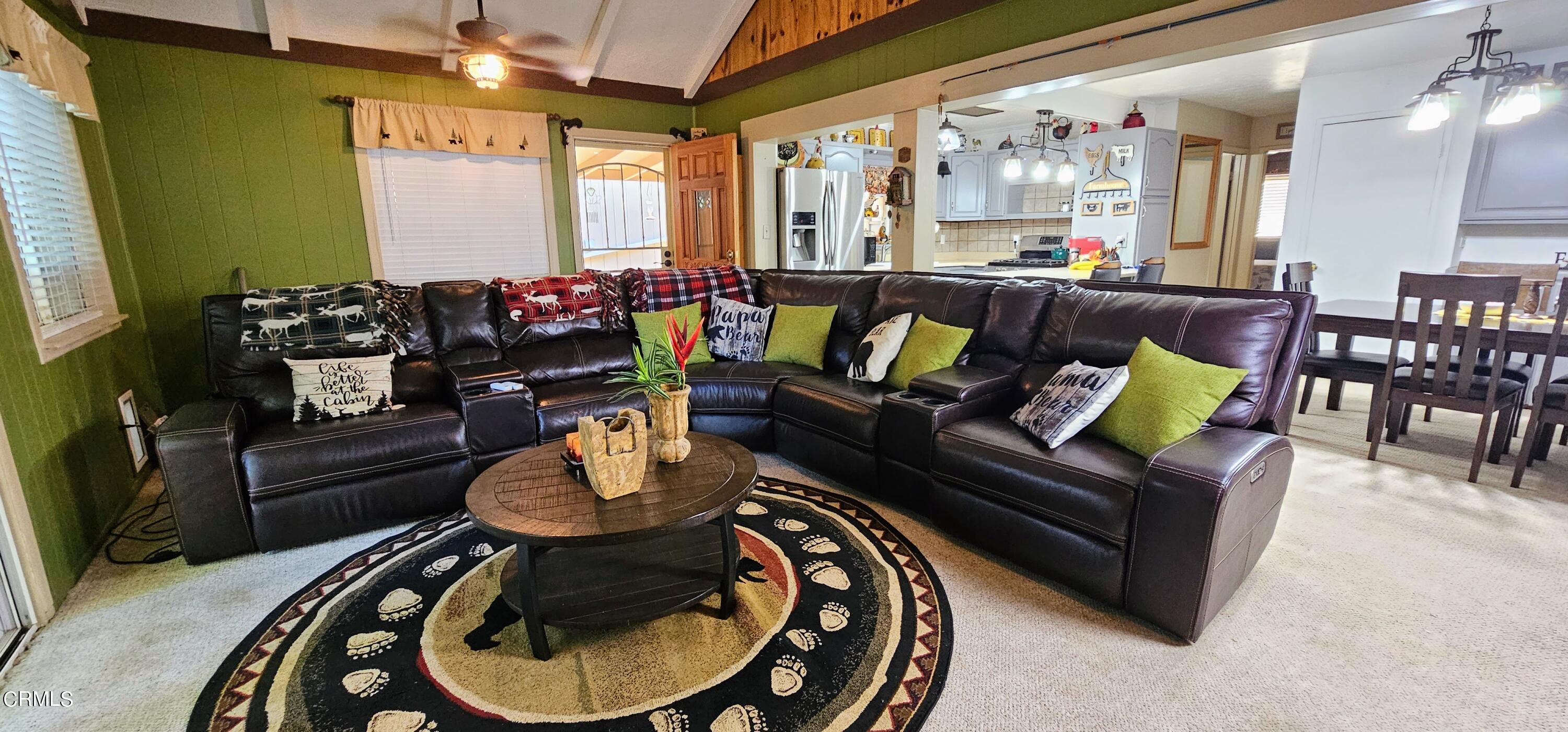 1157 Eugene Maricopa Ca Maricopa, CA 93252 - Photo 3 of 28 a living room with furniture and a chandelier