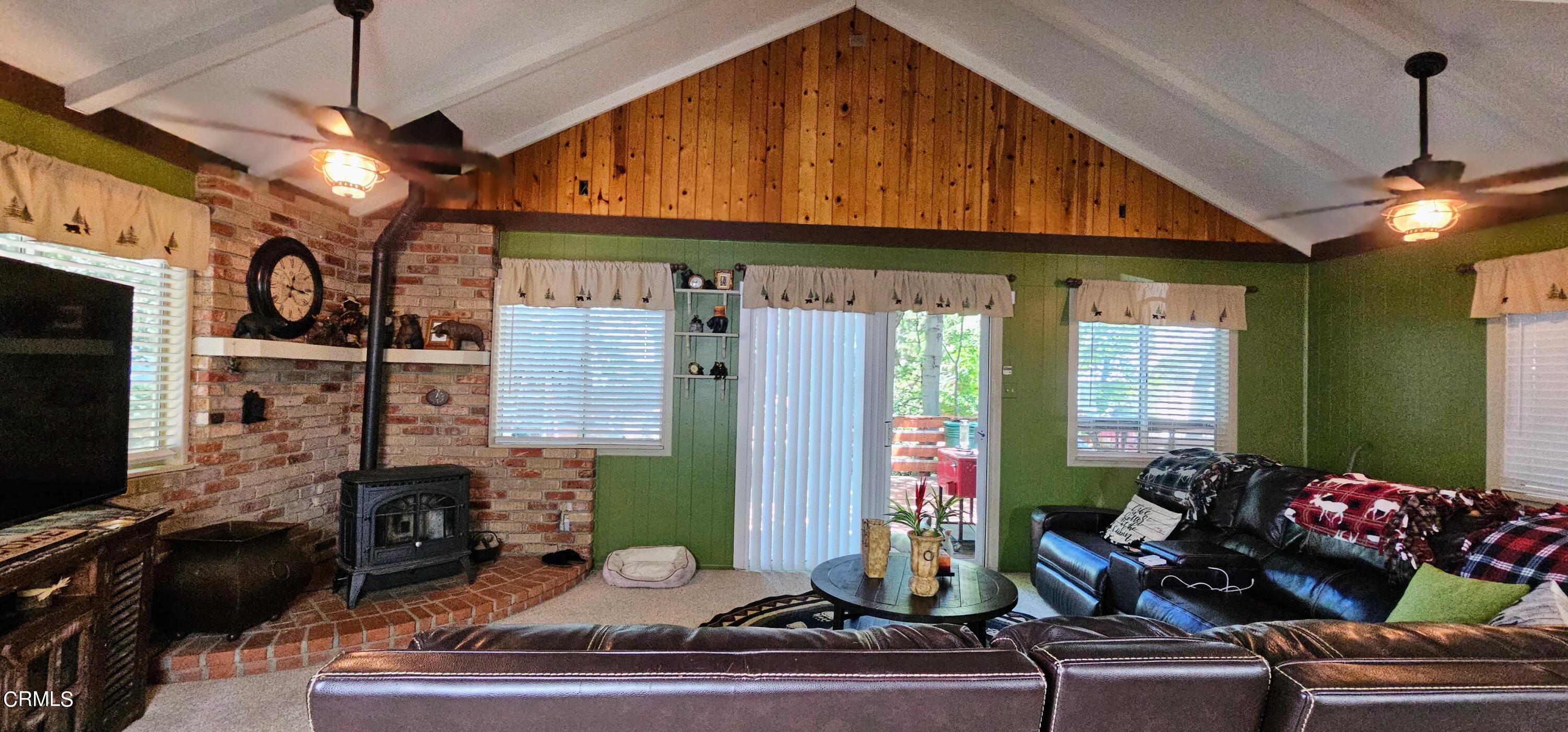 1157 Eugene Maricopa Ca Maricopa, CA 93252 - Photo 4 of 28 a room with lots of furniture and a chandelier