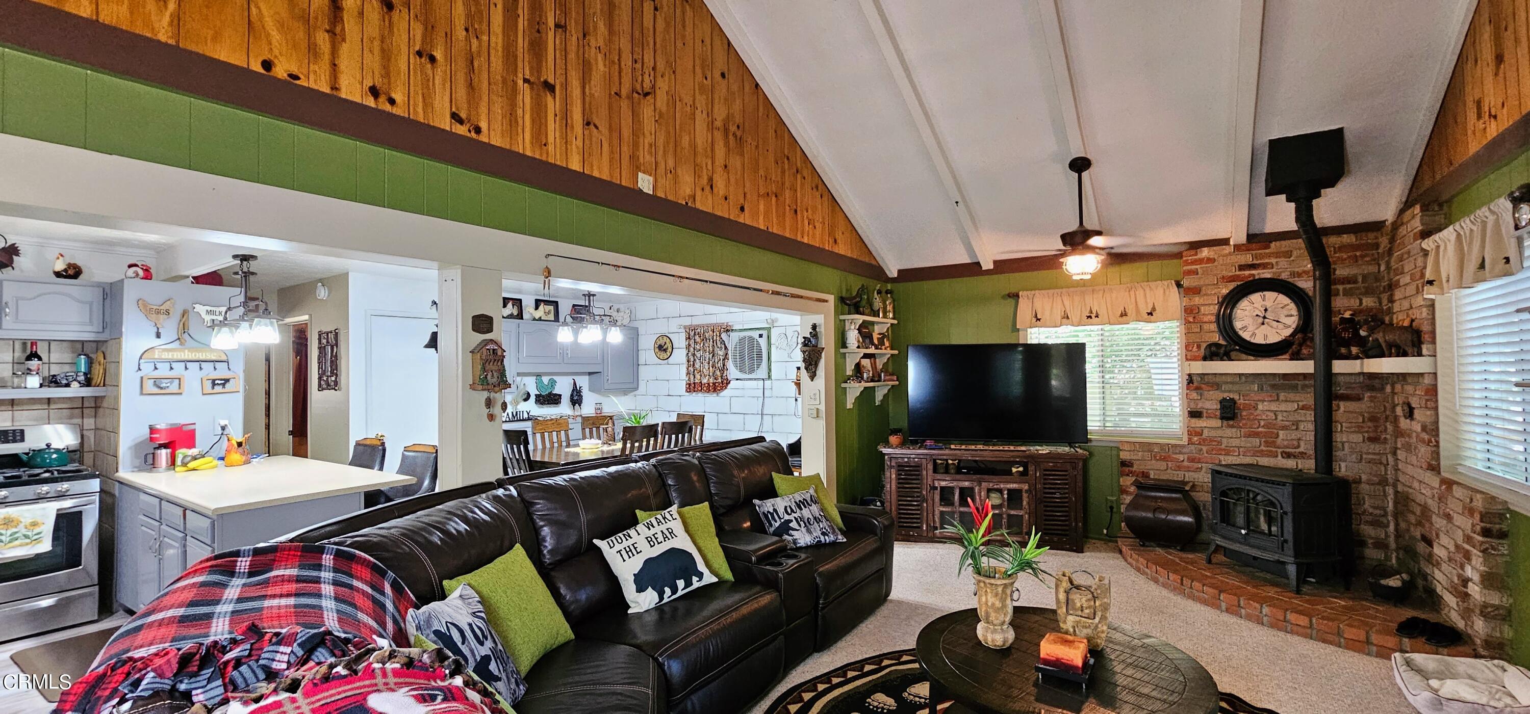 1157 Eugene Maricopa Ca Maricopa, CA 93252 - Photo 9 of 28 a living room with furniture and a flat screen tv
