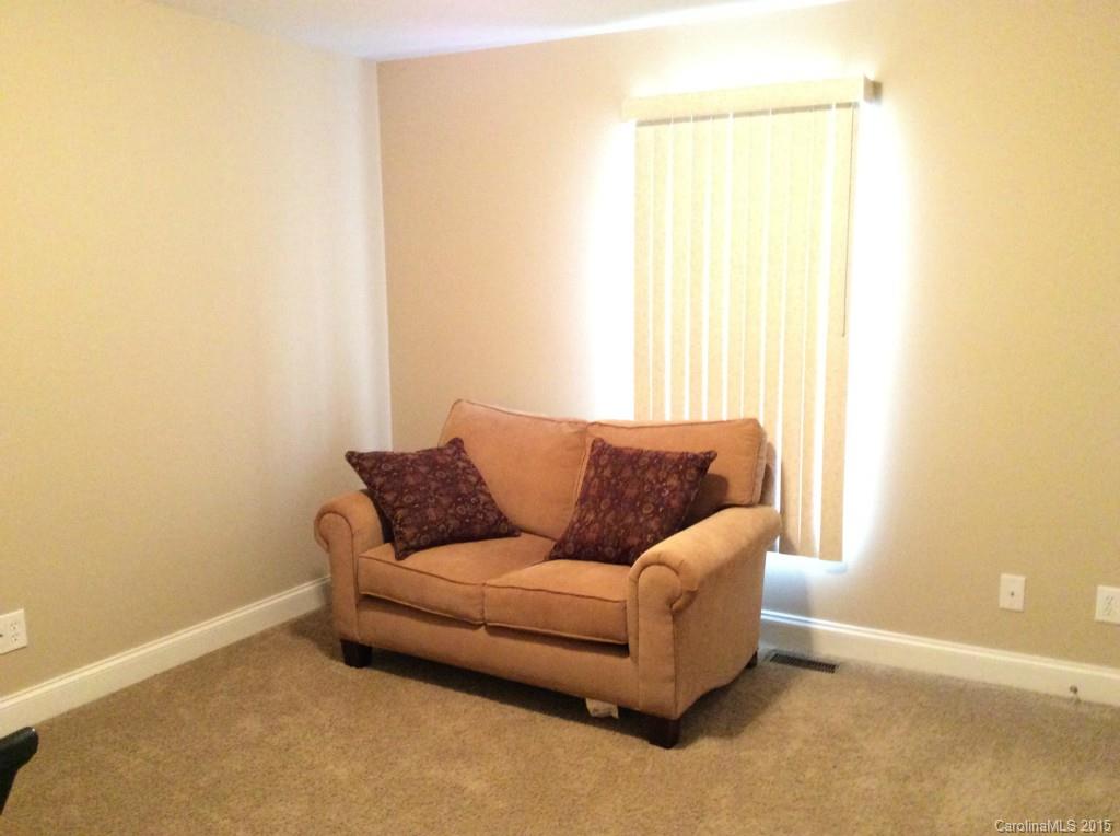 345 Gold Knob Road Salisbury, NC 28146 - Photo 12 of 15 a living room with a couch