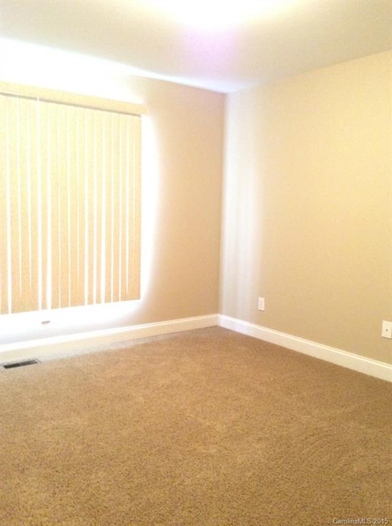 345 Gold Knob Road Salisbury, NC 28146 - Photo 13 of 15 an empty room with a empty space and a window