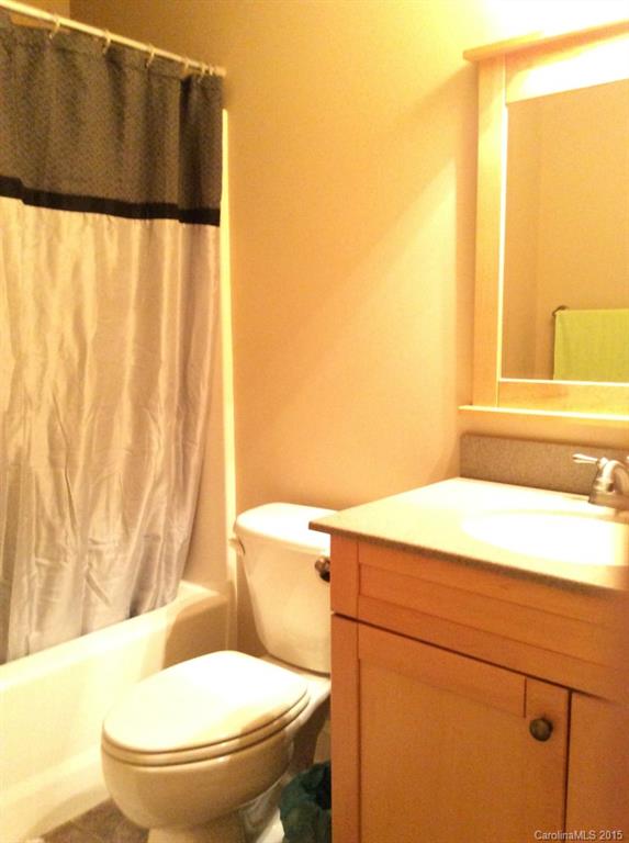 345 Gold Knob Road Salisbury, NC 28146 - Photo 14 of 15 a bathroom with a sink and a toilet