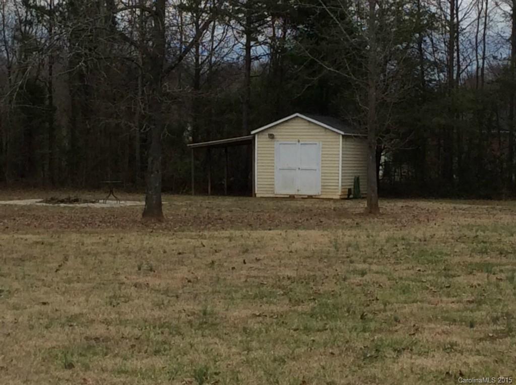 345 Gold Knob Road Salisbury, NC 28146 - Photo 4 of 15 a house with trees in the background