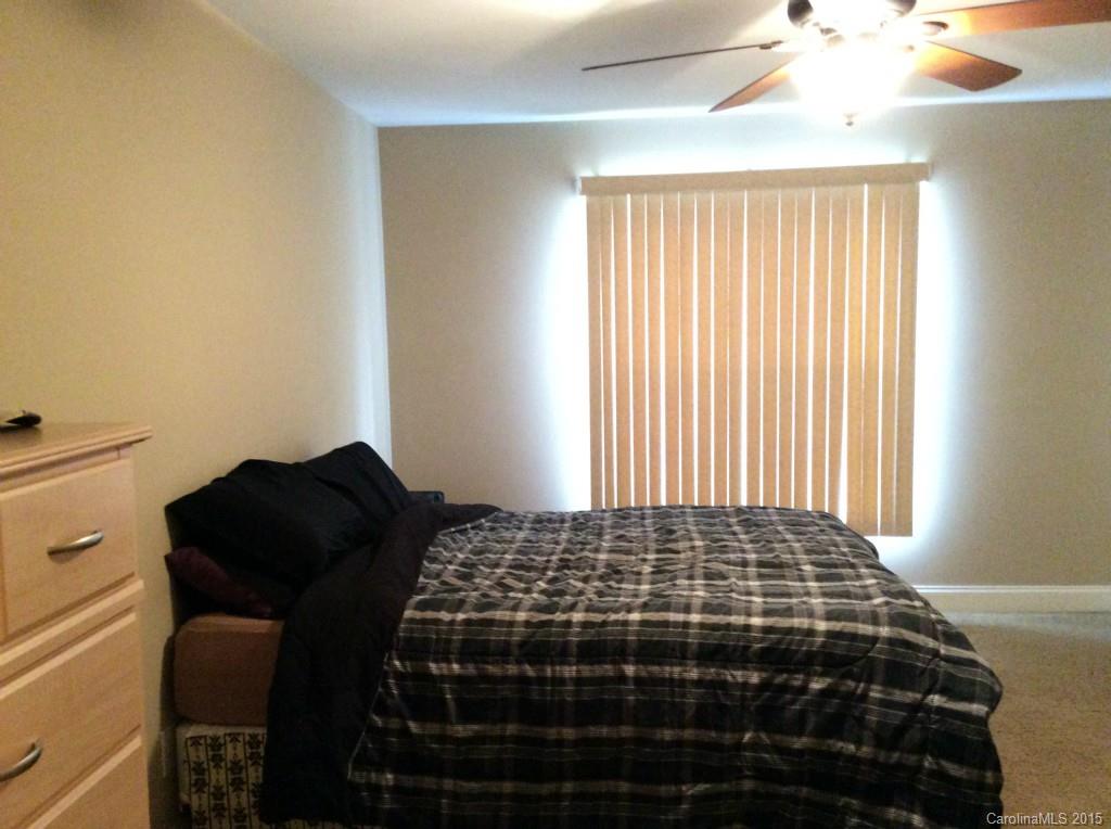 345 Gold Knob Road Salisbury, NC 28146 - Photo 10 of 15 a bedroom with a bed and a window